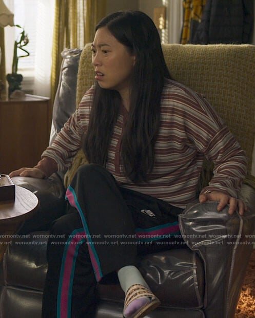 Nora's striped henley top and track pants on Awkwafina is Nora From Queens