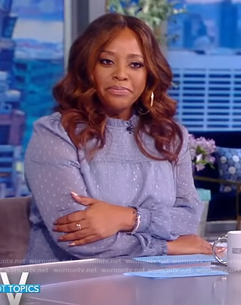 Sherri Sheapherd's blue smocked mini dress on The View