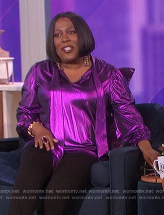 Sheryl's purple metallic tie neck blouse on The Talk