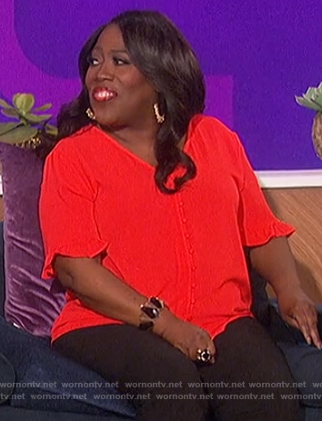 Sheryl's red button down blouse on The Talk