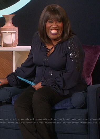 Sheryl's blue tassel embellished blouse on The Talk