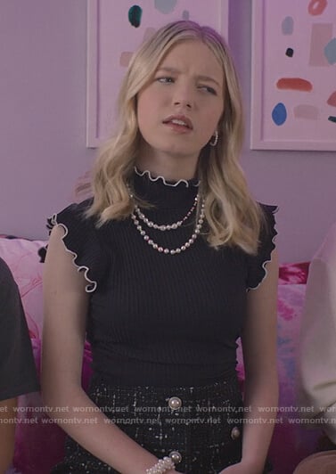 Stacey's black ruffle sleeveless top on The Baby-Sitters Club