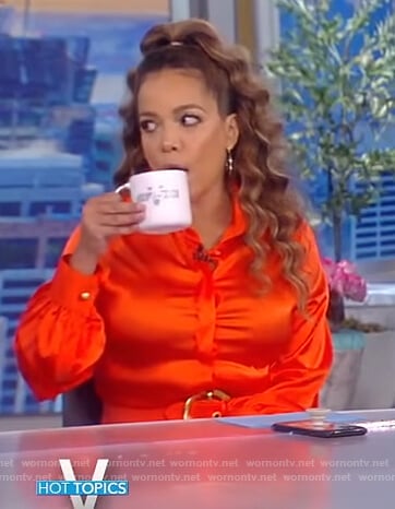 Sunny's orange belted dress on The View
