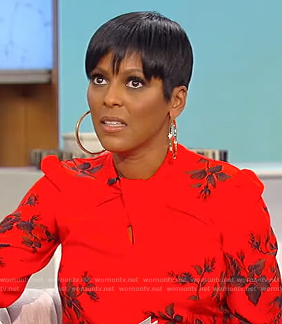 Tamron's red floral twist neck blouse on Tamron Hall Show