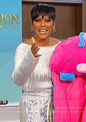 Tamron's silver metallic sweater and skirt on Tamron Hall Show