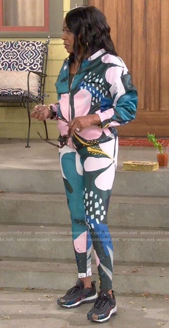 Tina's floral leggings and jacket set on The Neighborhood