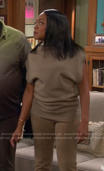 Tina's taupe top on The Neighborhood