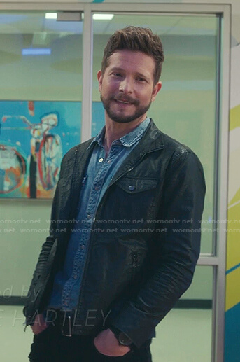 Conrad's chambray shirt and black leather jacket on The Resident