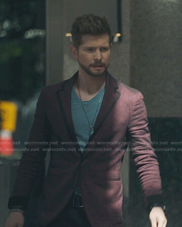 Conrad's red blazer with black piping on The Resident