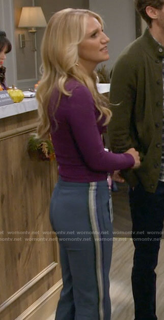 Gina's blue sweatpants with glitter stripes on B Positive