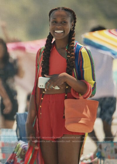 Issa's orange hoop hand bag on Insecure