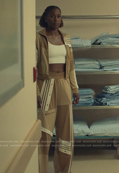 Issa's khaki Adidas tracksuit on Insecure