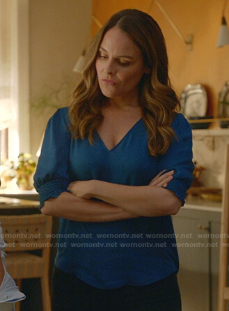 Izzy's blue v-neck top on Bull