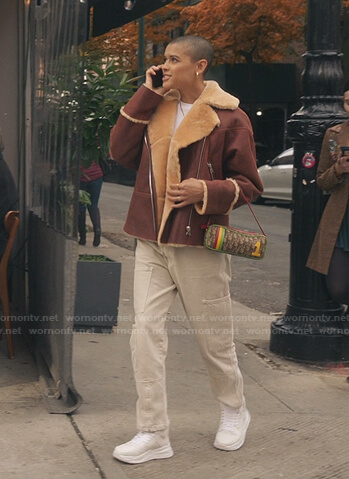 Julien's brown shearling leather jacket and pochette on Gossip Girl