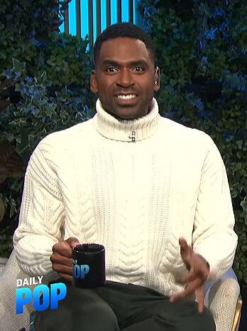 Justin's white cable knit turtleneck sweater on E! News Daily Pop