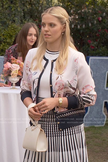 Leighton's white striped dress and floral cardigan on The Sex Lives of College Girls