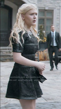Lexy's black lace dress with leather stripes on Chucky