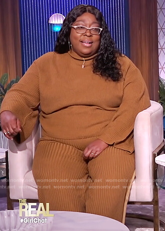 Loni's brown ribbed sweater and stripe pants on The Real