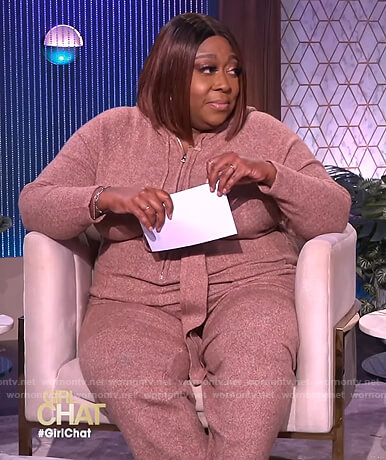 Loni's pink fuzzy jumpsuit on The Real