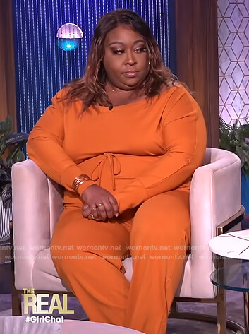 Loni's orange jumpsuit on The Real