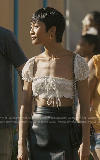 Margot's white lace crop top and leather skirt on I Know What You Did Last Summer