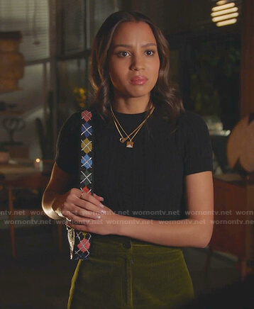 May's black cable knit short sleeve top and green corduroy skirt on 9-1-1