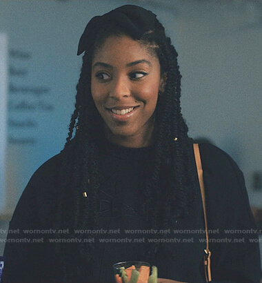Mia's black embroidered sweatshirt on Love Life