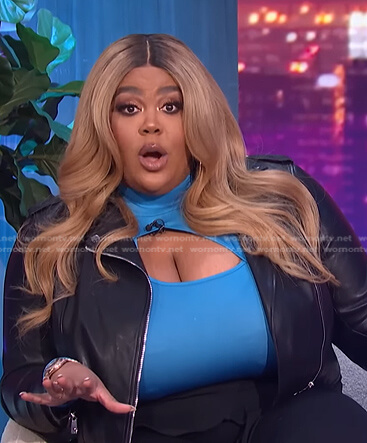 Nina's blue cutout bodysuit on E! News Nightly Pop