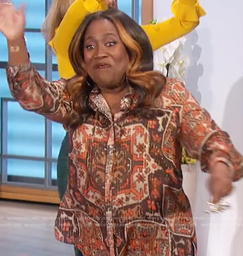 Sheryl's brown printed tie neck blouse on The Talk