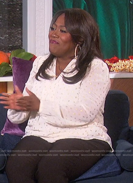 Sheryl's white metallic tie neck blouse on The Talk