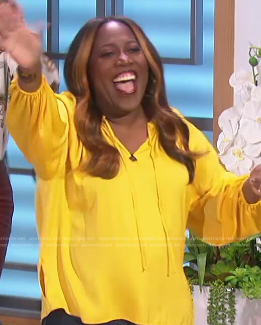 Sheryl's yellow tie neck blouse on The Talk