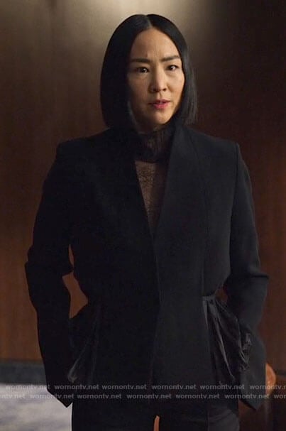 Stella's black pleated panel jacket on The Morning Show