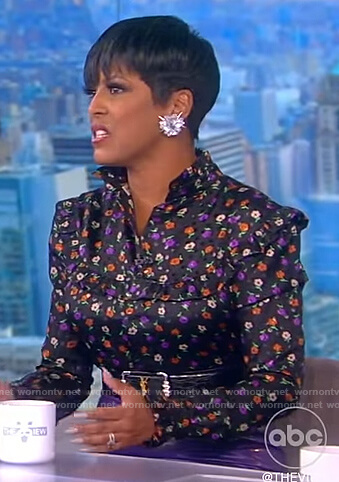 Tamron's black floral print ruffle blouse on The View
