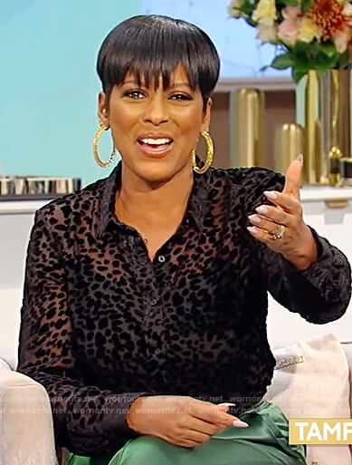 Tamron's black sheer leopard blouse on Tamron Hall Show