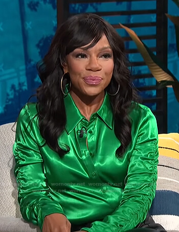 Wendy Raquel Robinson's green ruched sleeve shirt on E! News Daily Pop
