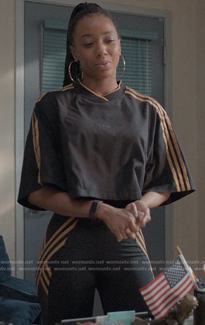 Whitney's black striped crop top and leggings set on The Sex Lives of College Girls