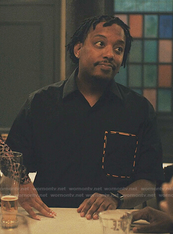 Yogi's black short sleeve shirt on Love Life