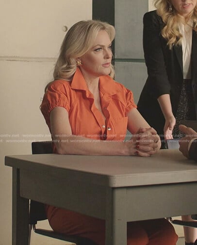 Alexi's orange jumpsuit on Dynasty