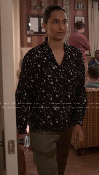 Bela's star print shirt and satin cargo pants on The Sex Lives of College Girls
