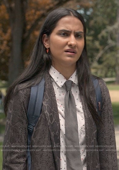 Bela's star print shirt and heart earrings on The Sex Lives of College Girls