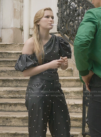 Camille's black studded leather top and pants on Emily in Paris