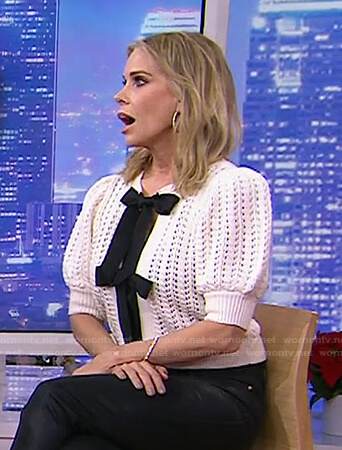 Cheryl Hines's white open knit bow cardigan on Today