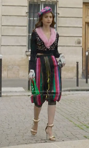 Emily's embellished fur collar cardigan and striped pants on Emily in Paris