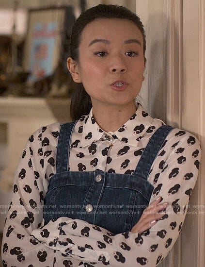 Evangeline's face print shirt and denim dress on The Sex Lives of College Girls