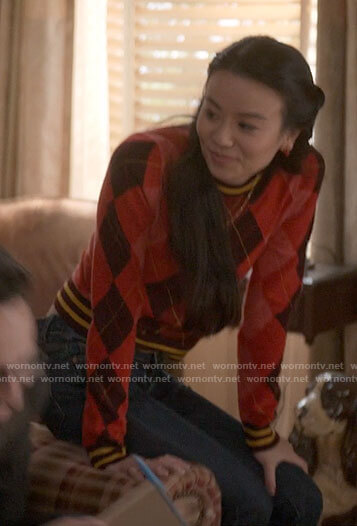 Evangeline's red argyle sweater on The Sex Lives of College Girls