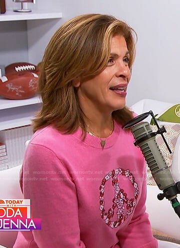 Hoda's pink floral peace sweater on Today