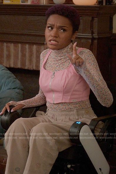 Jocelyn's floral top and smiley pants on The Sex Lives of College Girls
