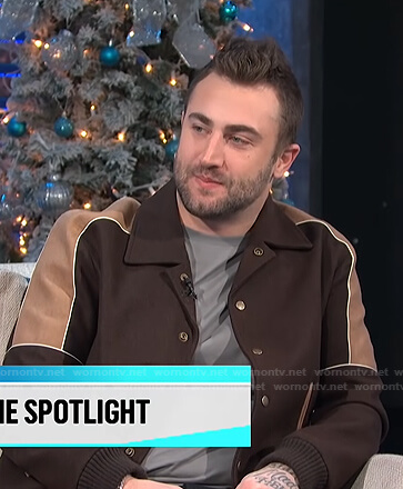 Jordan McGraw's brown colorblock varsity jacket on E! News Daily Pop