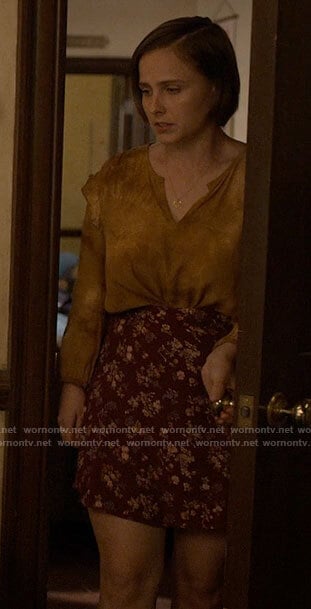 Kimberly's yellow tie dye top and red floral skirt on The Sex Lives of College Girls