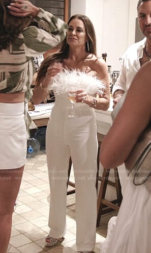 Kyle's white feather-trim strapless jumpsuit on The Real Housewives Ultimate Girls Trip